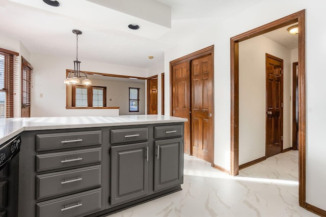 kitchen featuring a healthy amount of sunlight, decorative light fixtures, gray cabinets, and black dishwasher