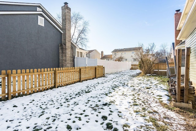 view of snowy yard