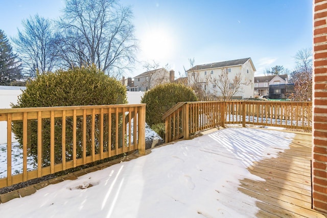 view of snow covered deck