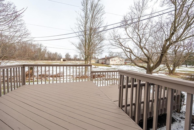 view of snow covered deck