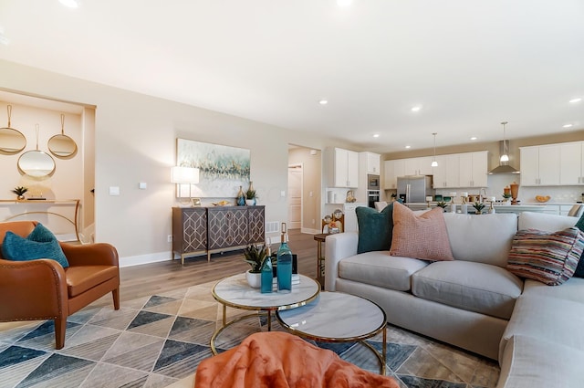 living room with light hardwood / wood-style flooring