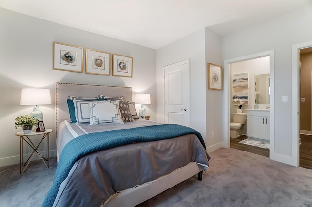 carpeted bedroom with ensuite bathroom