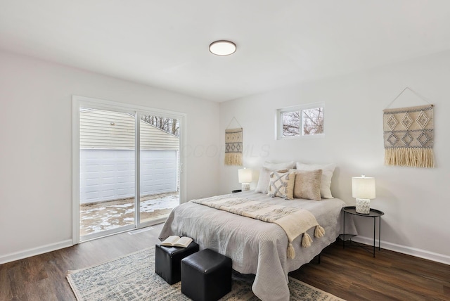 bedroom with dark wood-type flooring and access to exterior