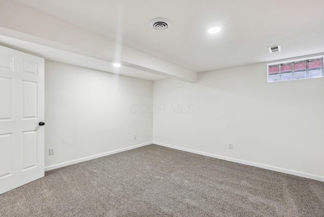 basement with carpet flooring