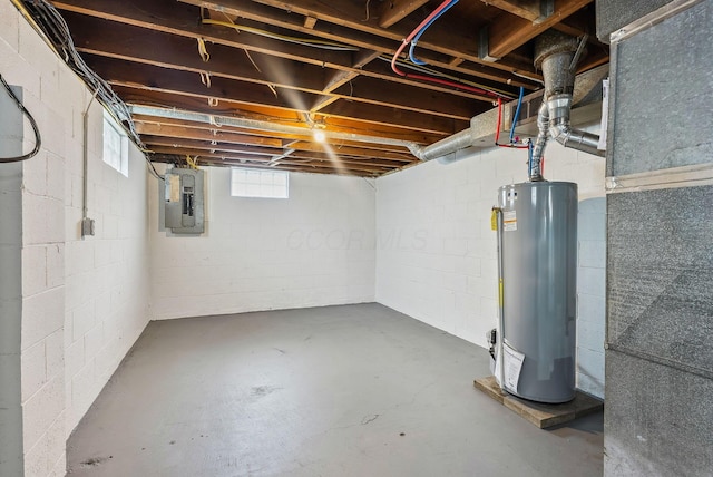 basement featuring water heater and electric panel