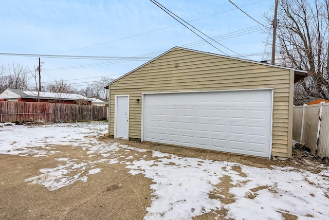 view of snow covered garage