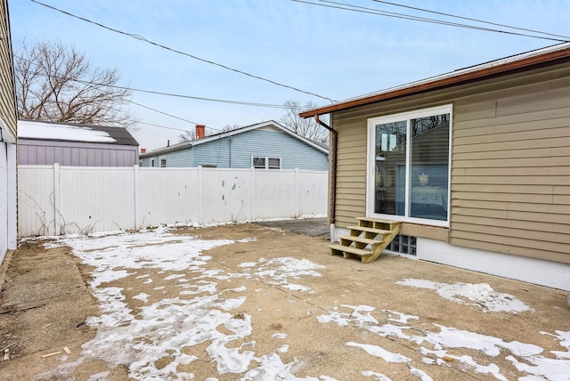 view of snow covered patio