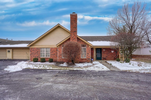 ranch-style home with a garage