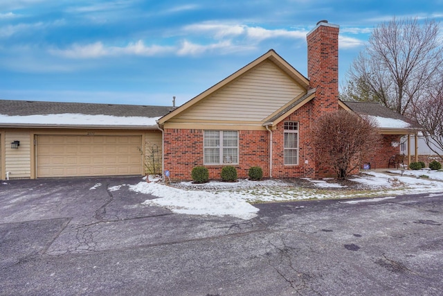 ranch-style home with a garage