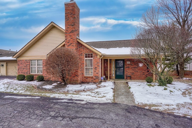 single story home featuring a garage