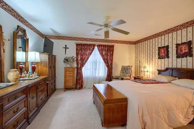 bedroom featuring light carpet