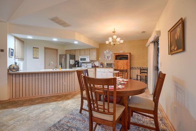 dining room with an inviting chandelier