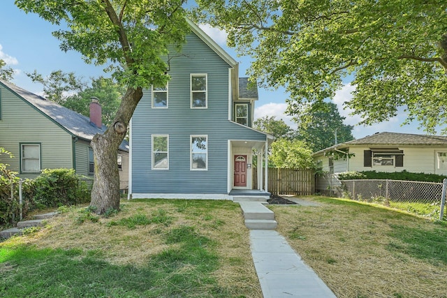 view of front of property featuring a front yard