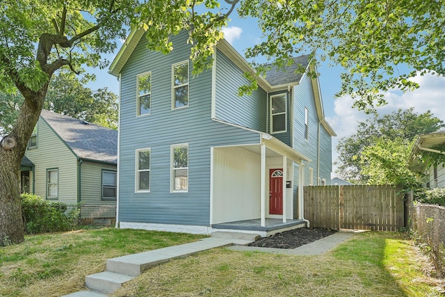 view of front of home with a front yard