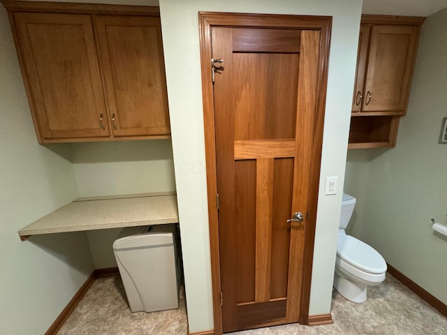 bathroom featuring toilet