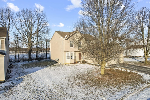 view of snow covered property