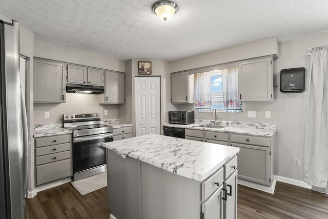 kitchen featuring sink, gray cabinets, and appliances with stainless steel finishes