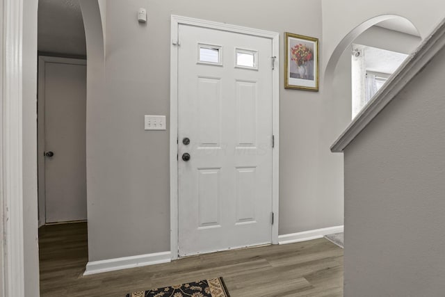 foyer entrance featuring hardwood / wood-style floors