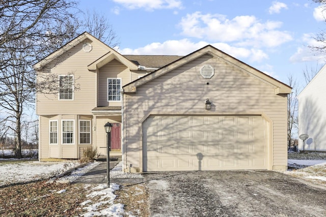 view of front of home with a garage