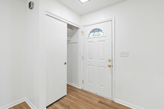 entrance foyer with light wood-type flooring