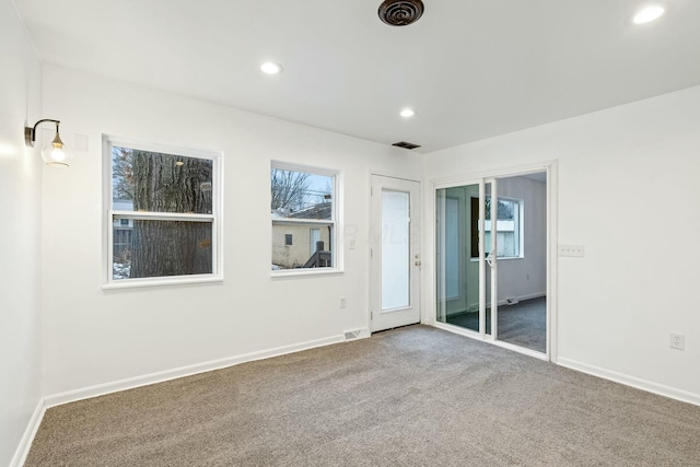 empty room featuring carpet flooring