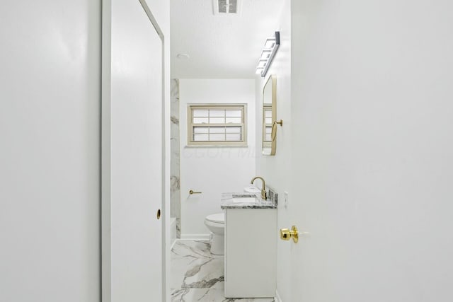 full bathroom featuring vanity, toilet, a textured ceiling, and shower / bath combination