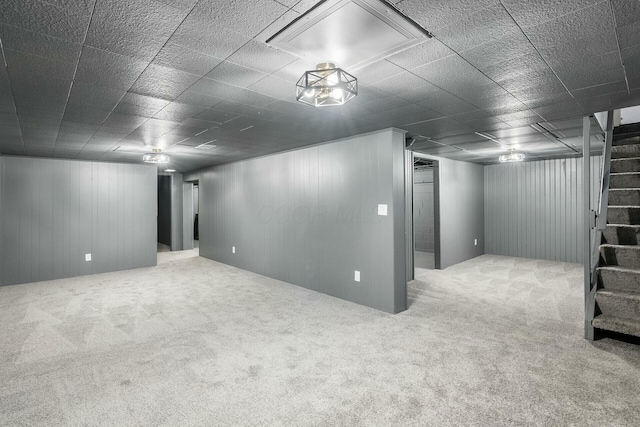 basement with carpet flooring