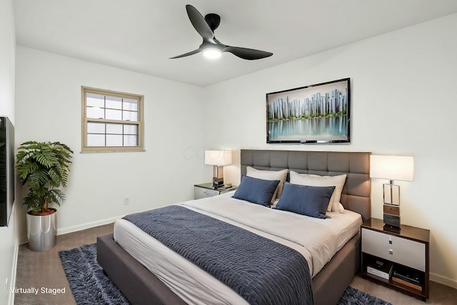 carpeted bedroom with ceiling fan