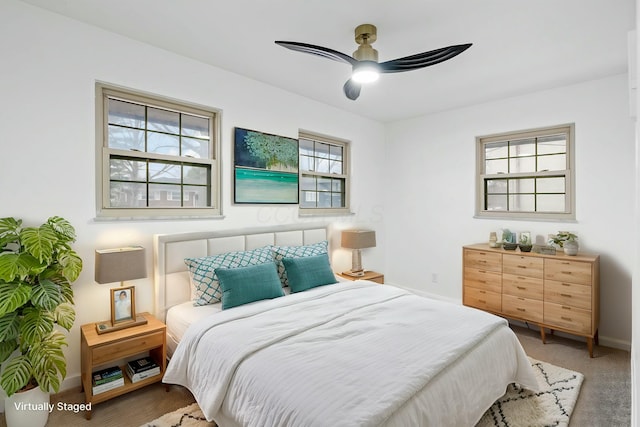 bedroom featuring carpet flooring and ceiling fan