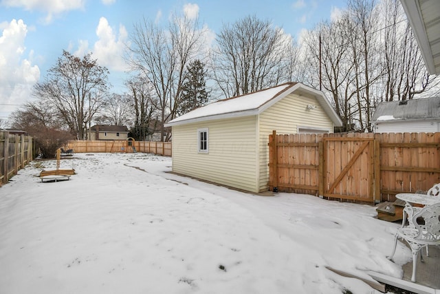 view of yard covered in snow