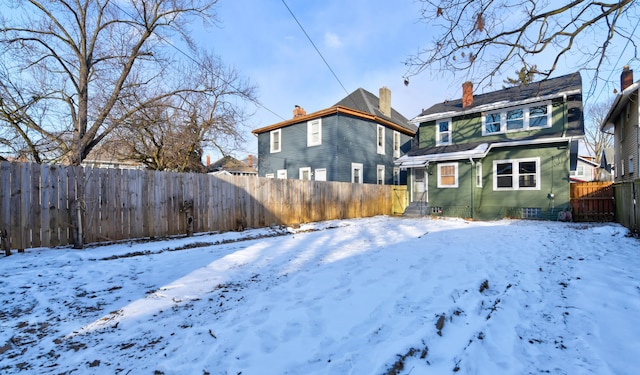 view of snow covered property