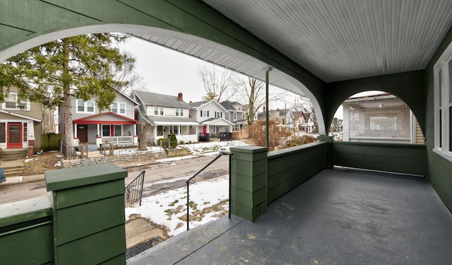 view of patio featuring a porch