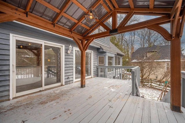 view of snow covered deck