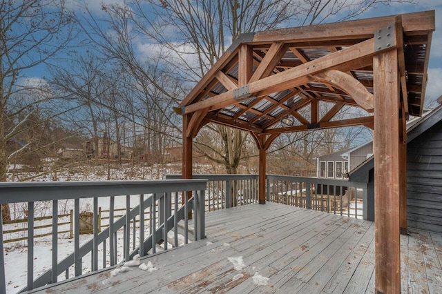 view of snow covered deck