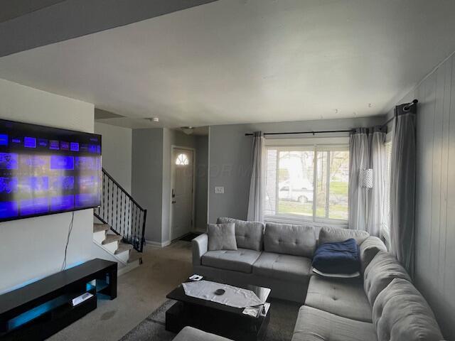 868-870 Wiltshire Rd, Columbus, OH 43204 - carpeted living area with baseboards and stairway