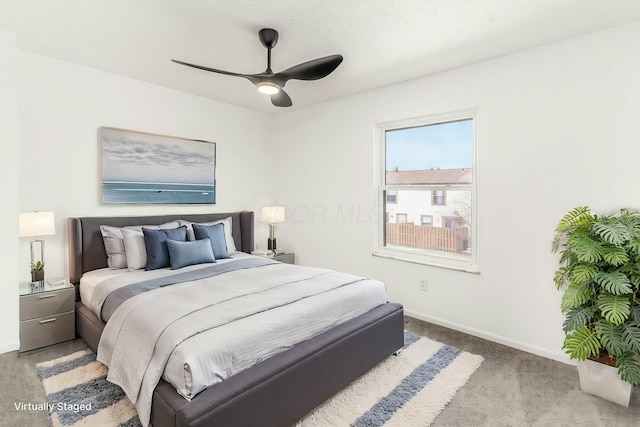 bedroom with ceiling fan and carpet floors