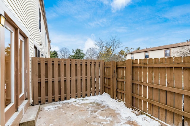 view of snow covered patio