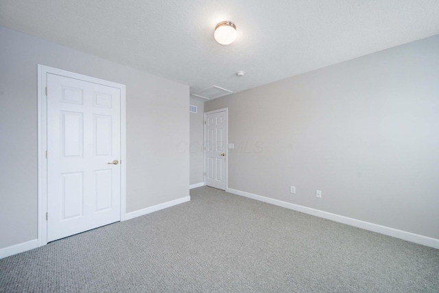 spare room with carpet flooring