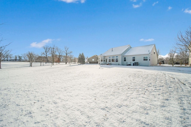 view of snow covered house