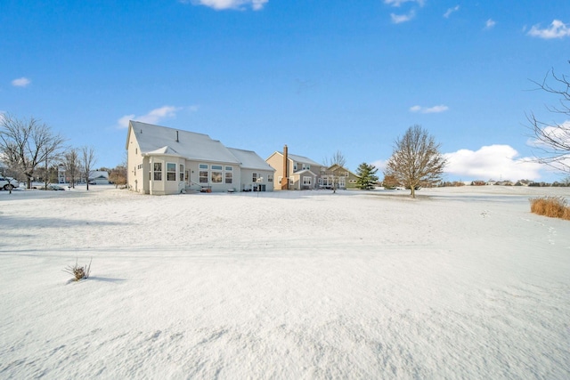 view of snow covered property