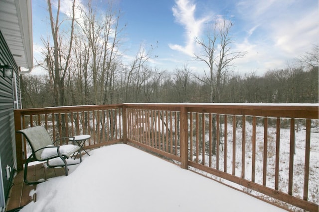 view of snow covered deck