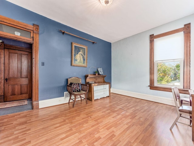 living area featuring light hardwood / wood-style flooring