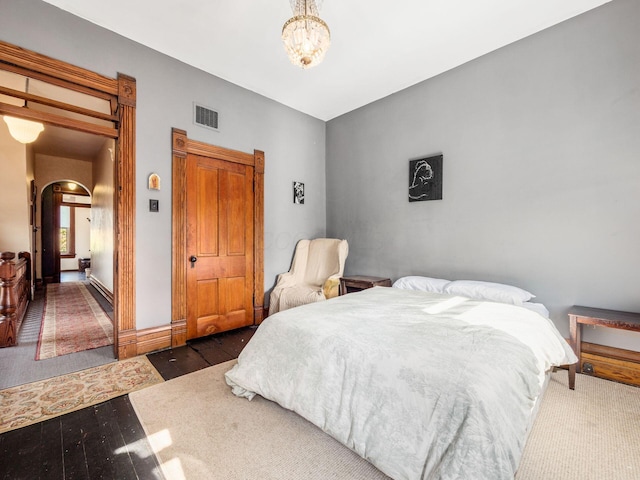 bedroom featuring hardwood / wood-style flooring