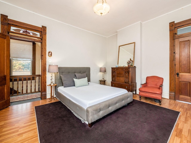 bedroom featuring wood-type flooring