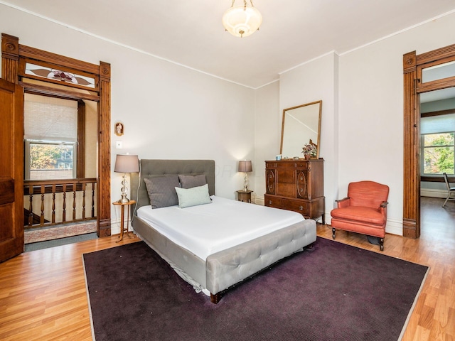 bedroom with wood-type flooring