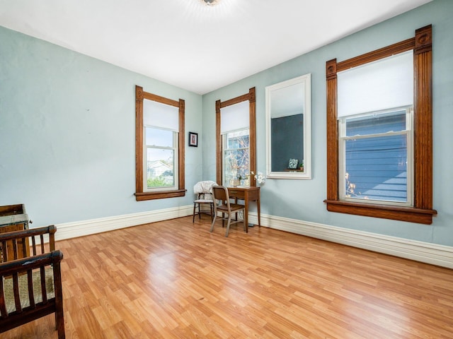 sitting room with light hardwood / wood-style floors