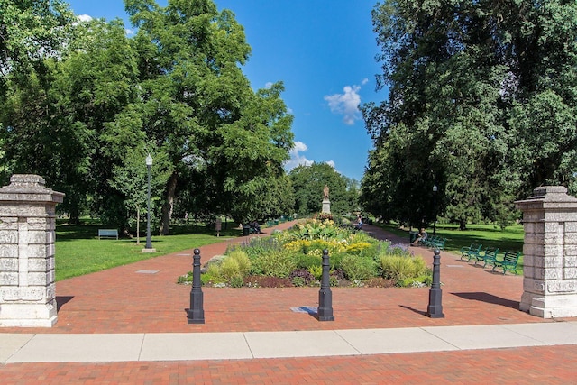 surrounding community featuring a lawn