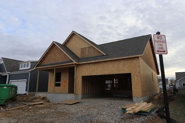 view of front of property with a garage