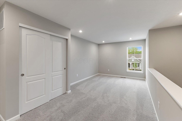 1208 Heathgate Way, Fairborn, OH 45324 - unfurnished bedroom with carpet, recessed lighting, baseboards, and a closet