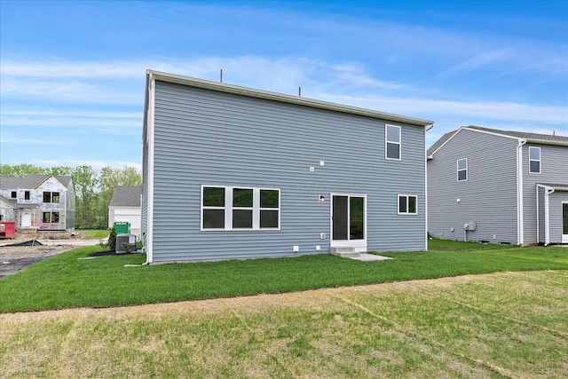 1208 Heathgate Way, Fairborn, OH 45324 - back of house featuring entry steps and a yard